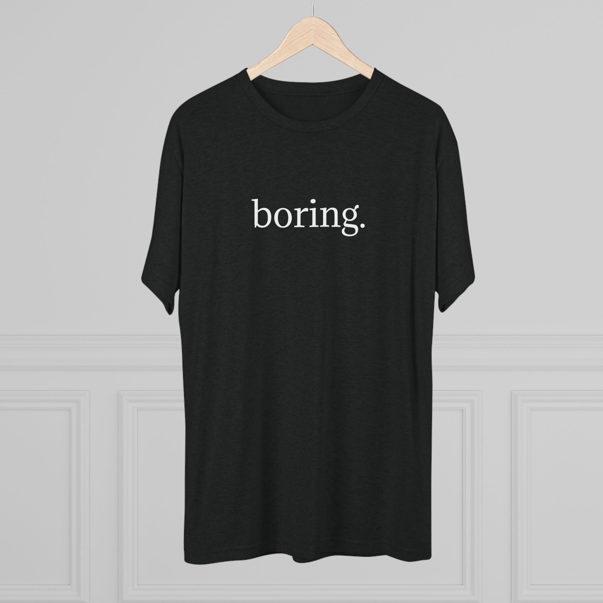 The Most Boring T-Shirt Ever Made — Minimalist Black Graphic T‑Shirt with 'boring.' Text