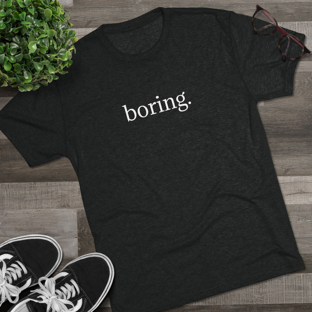 The Most Boring T-Shirt Ever Made — Minimalist Black Graphic T‑Shirt with 'boring.' Text